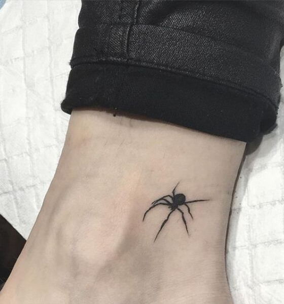 Spider tattoo on ankle