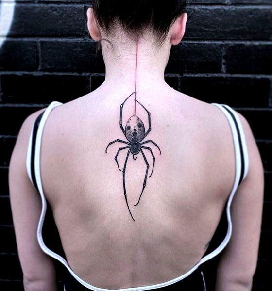 Spider tattoo on back