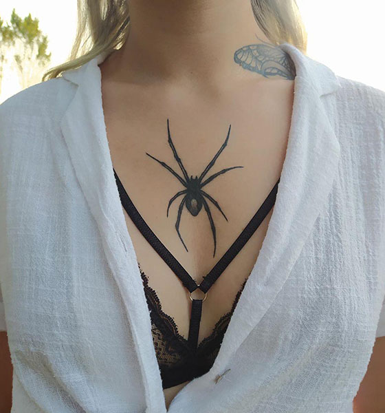 Spider tattoo on chest