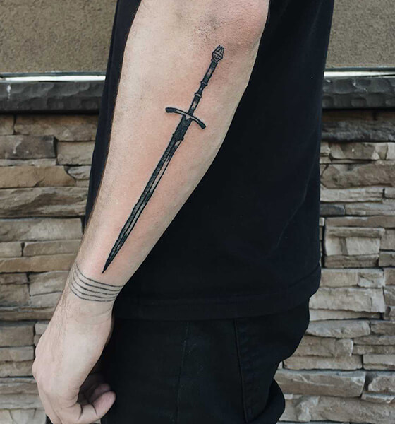 Sharp Sword Tattoo on Forearm