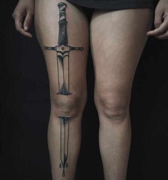 Sword tattoo design on leg