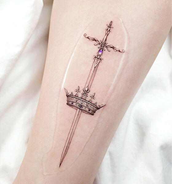 Sword with Crown Tattoo on Arm