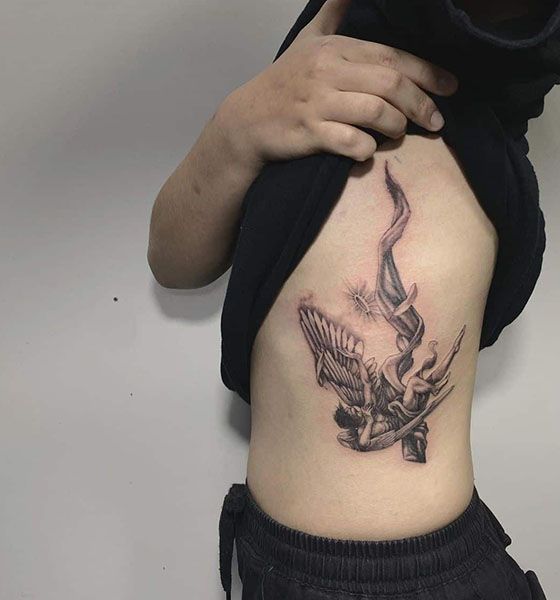 Fallen Angel Tattoo on Rib Cage