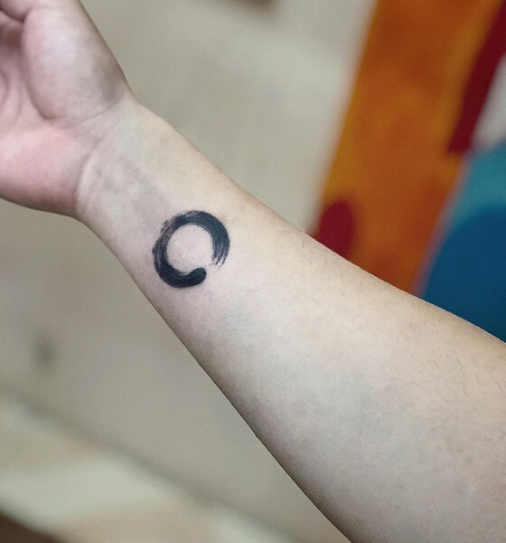 Small Circle Tattoo on Wrist