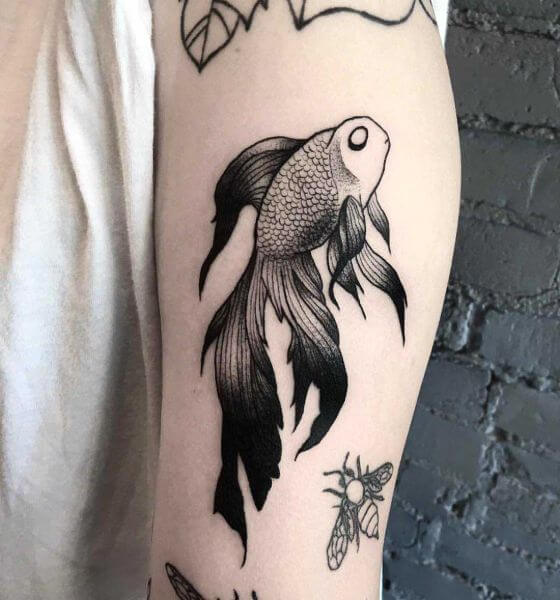 Beautiful koi fish tattoo on thigh
