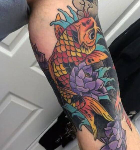 Color koi fish tattoo on leg