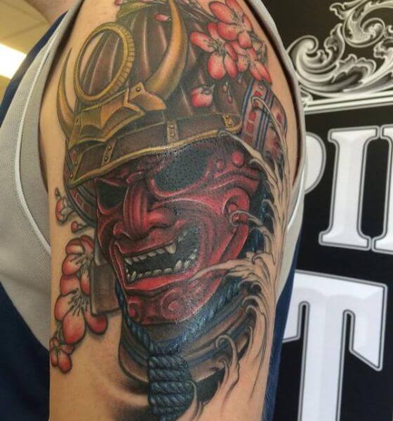 Colored samurai tattoo on left shoulder