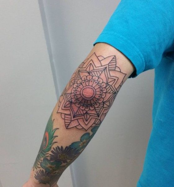 Geometric Flower Tattoo Design on Elbow