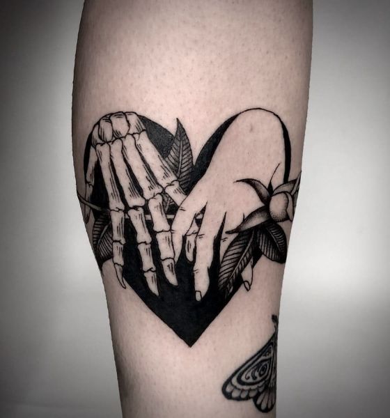 Gothic Hand with Heart Tattoo Designs
