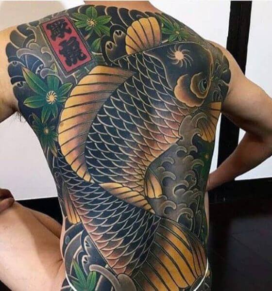 Huge koi fish tattoo on back