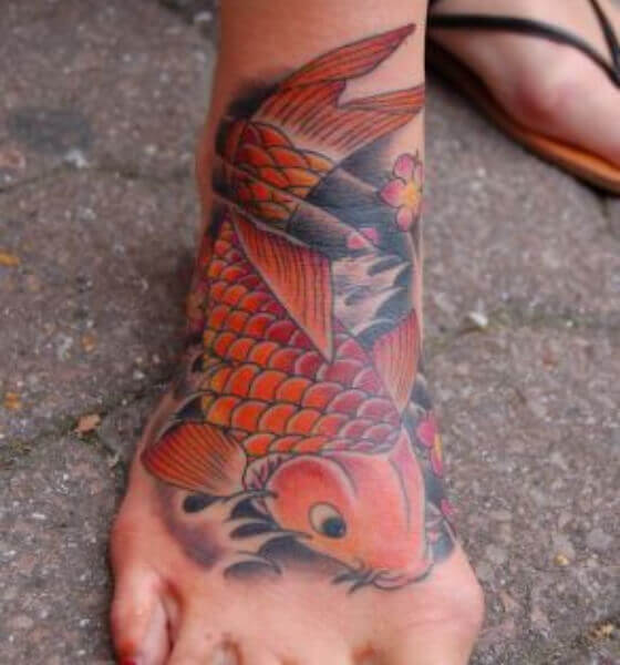 Koi fish tattoo on foot