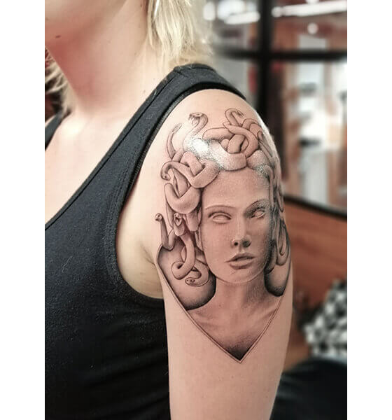 Medusa Statue Tattoo Design