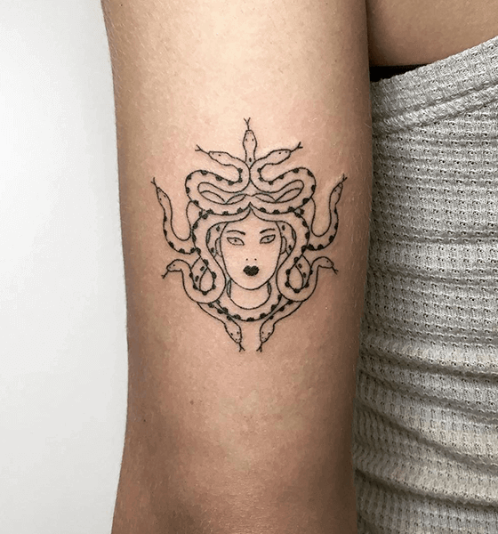 Medusa tattoo on arm