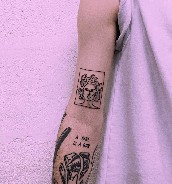 Medusa tattoo on bicep