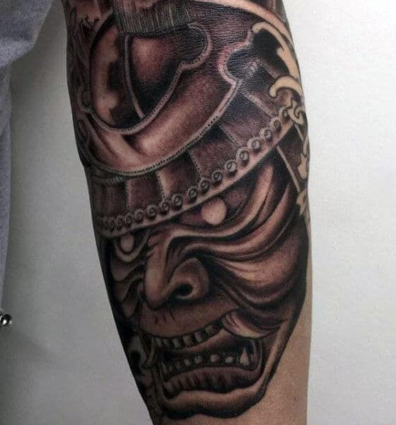 Samurai mask tattoo on forearm