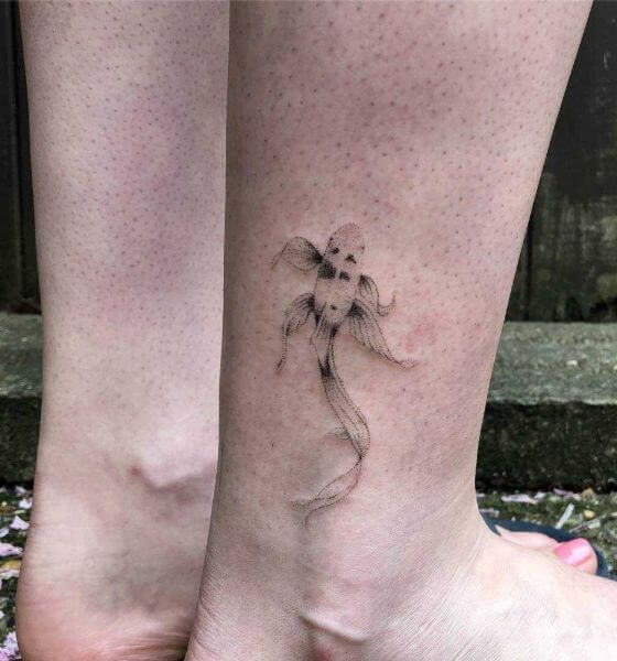 Simple Koi fish tattoo on leg