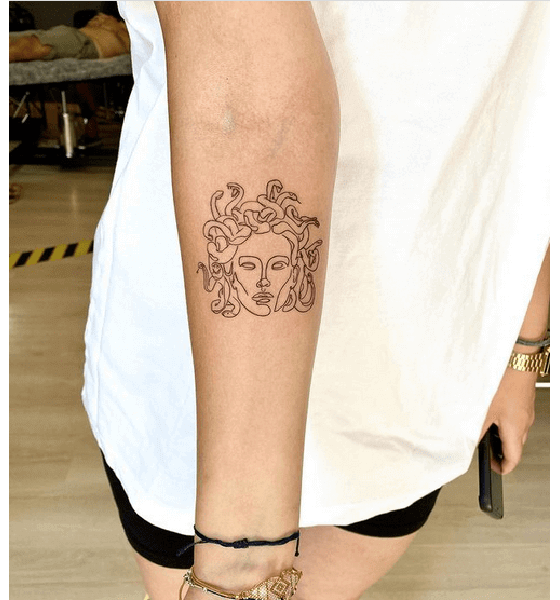 Simple Medusa Tattoo on Inner Arm
