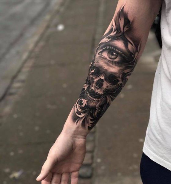 Skull with Large Eye Tattoo on Arm