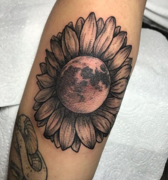 Sunflower tattoo on elbow