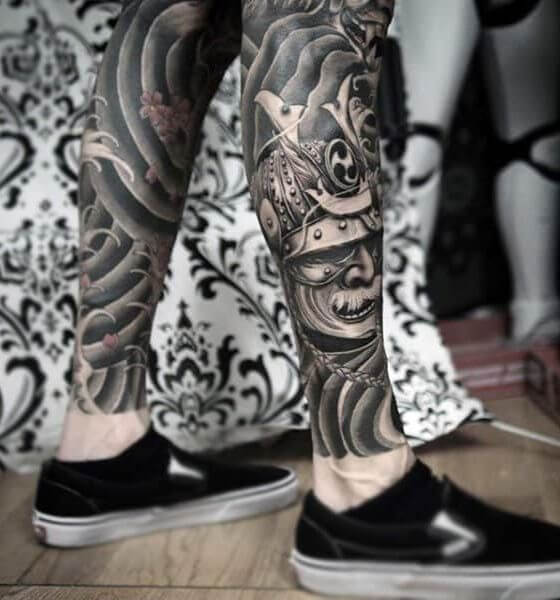 Tribal samurai mask calf tattoo