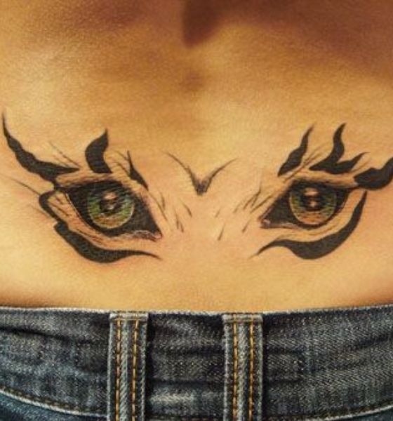 Exotic Animal Eye Tattoo Design on Lower Back