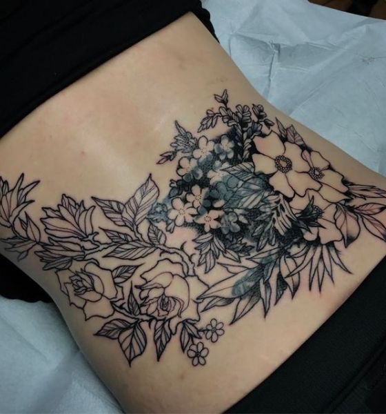 Gorgeous Flower Tattoo on Lower Back for Women