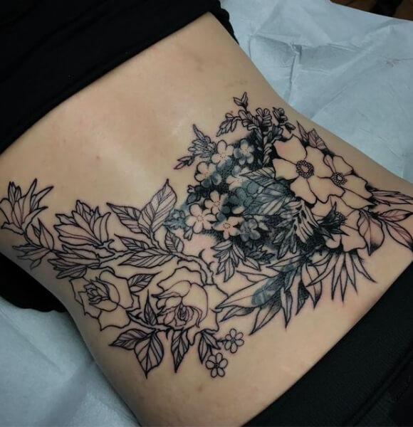 Gorgeous Flower Tattoo on Lower Back for Women
