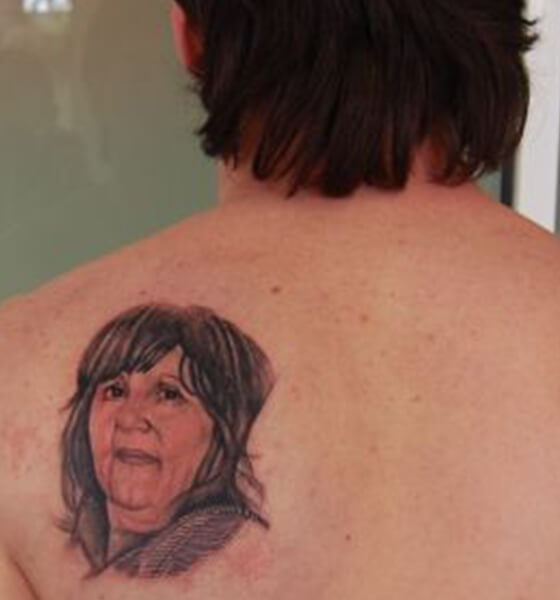 Mother's Portrait Tattoo on Messi's Back