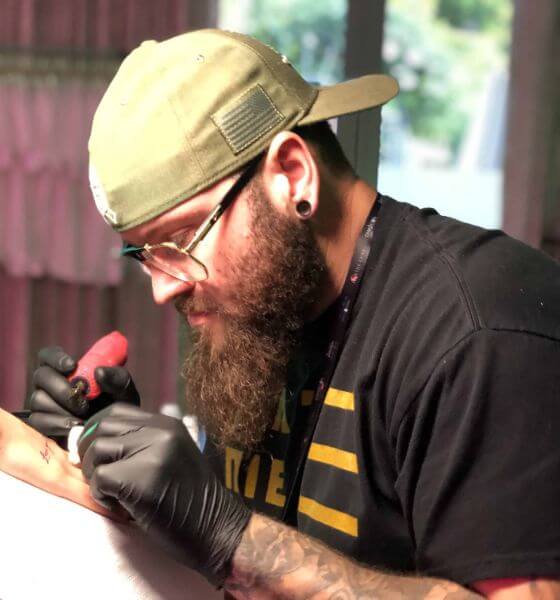 Omar is a tattoo artist based in Miami who is well-known for his portrait tattoos