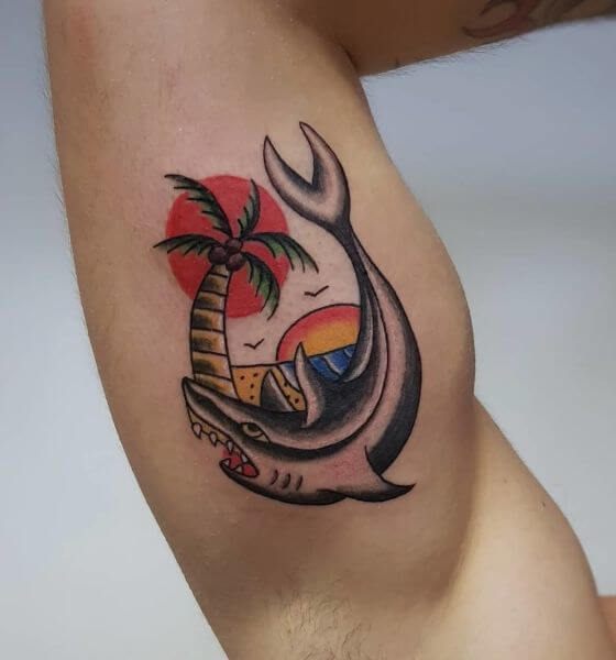 Power shark tattoo on bicep