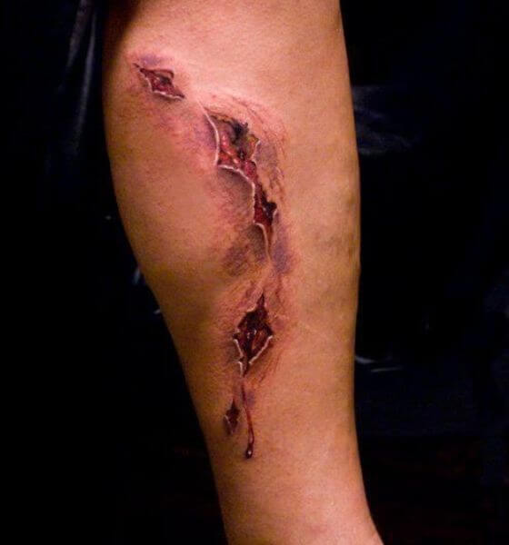 Shark Bite Tattoo on Leg