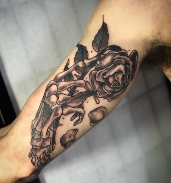 Skeleton Hand with Rose Tattoo on Inner Bicep