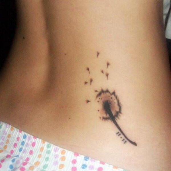 Small Dandelion Tattoo on Lower Back