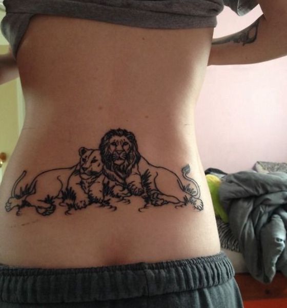 Strength Tattoo on Lower Back for Women