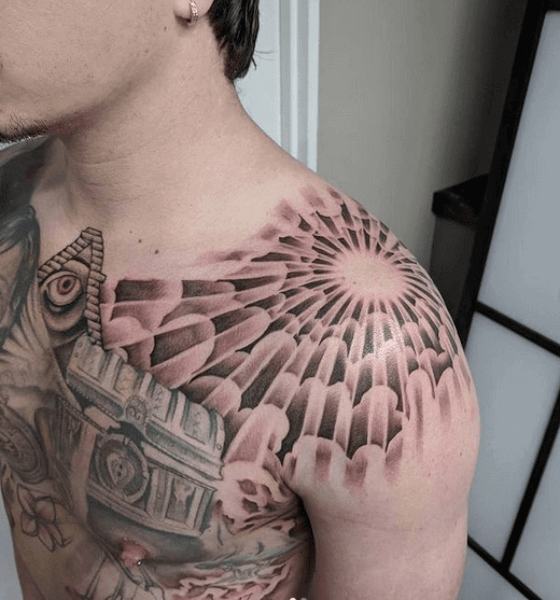Sun rising tattoo design on shoulder