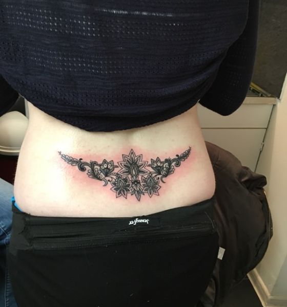 Symmetrical Tattoo Design on the Lower Back