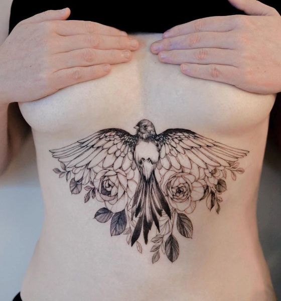 Underboob Symbolic Bird Tattoo Design