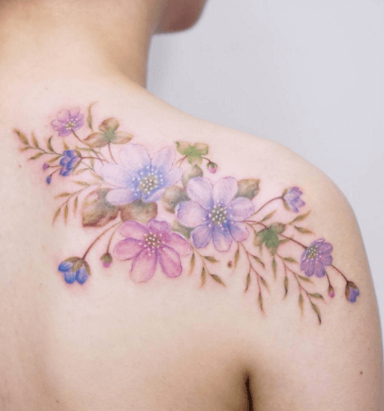 Watercolor blossom tattoo