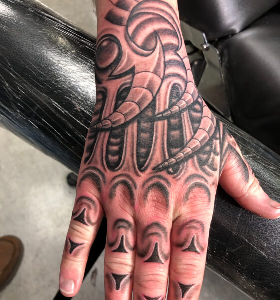 Biomechanical tattoo on hand