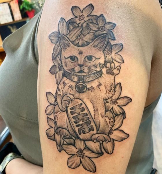 Cat tattoo on shoulder