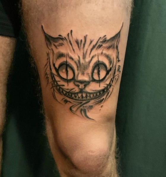 Cheshire Cat Tattoo on Thigh