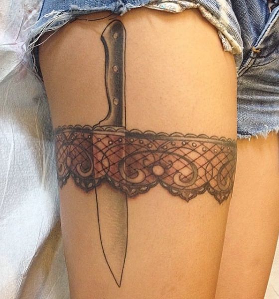Knife and Garter Tattoo on Thigh