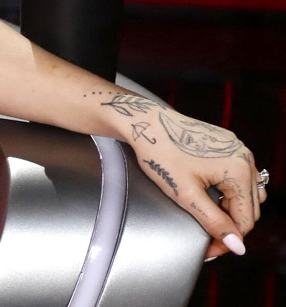 Ariana Grande's Branch with Leaves Tattoo