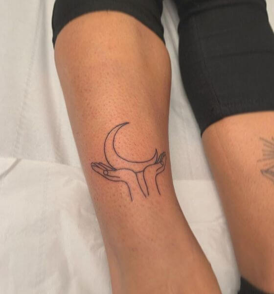 Moon in Hands Outline Tattoo on Leg