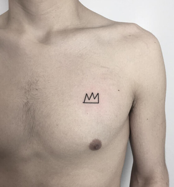 Tiny Crown Tattoo on Chest