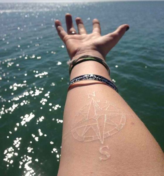 White Ink Compass Tattoo on Arm