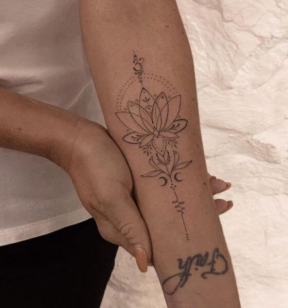 Spiritual Tattoo Design on Arm