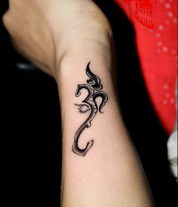 Innovative Om Symbol Tattoo on Wrist