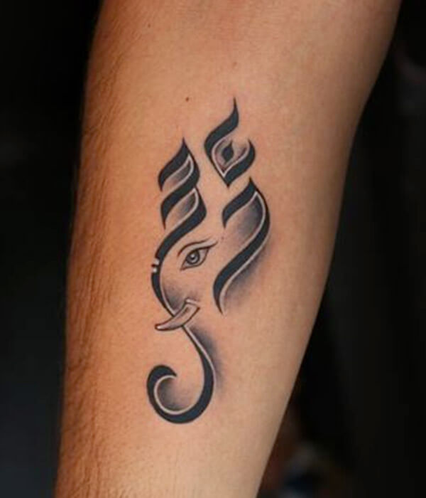 Lord Ganesha Face with Om Symbol Tattoo Designs