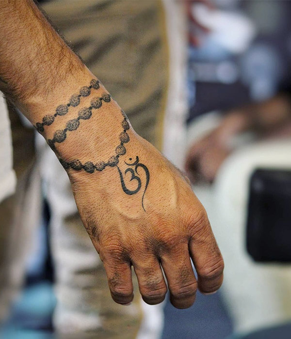 Om Tattoo Design on Wrist